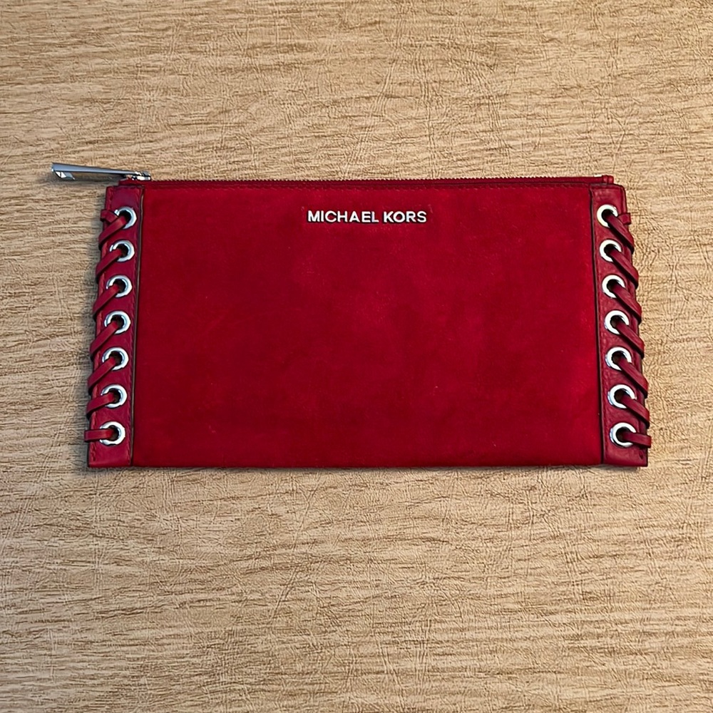 Red suede clutch bag